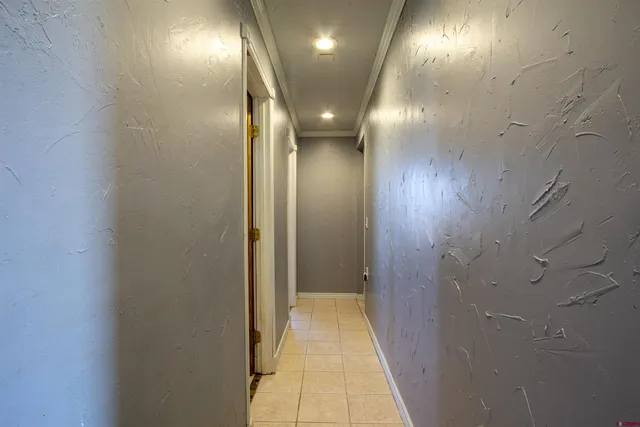 a view of hallway with windows