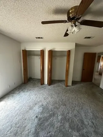 a room with table and chairs