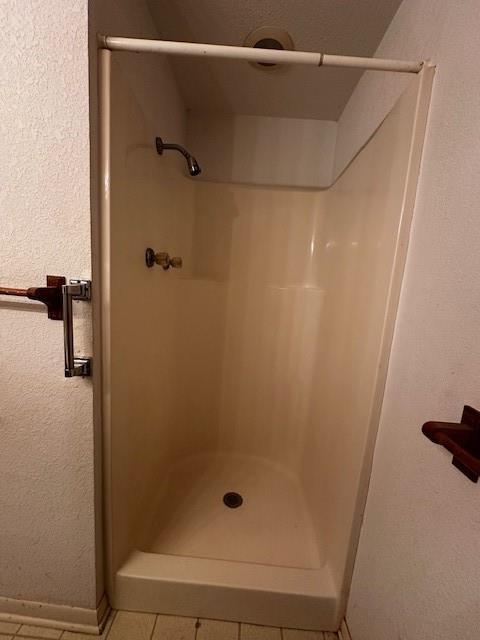 6294 Dugan Chapel Road Bells, TX 75414 - Photo 21 of 38 a bathroom with a glass shower door