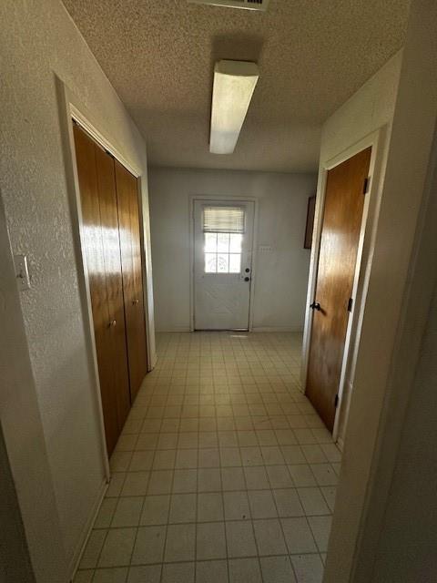 6294 Dugan Chapel Road Bells, TX 75414 - Photo 25 of 38 a view of an empty room with wooden floor and a window