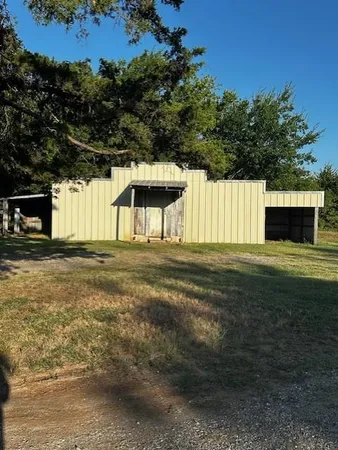 a view of a room with wooden racks