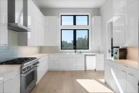 a bedroom with bed and window