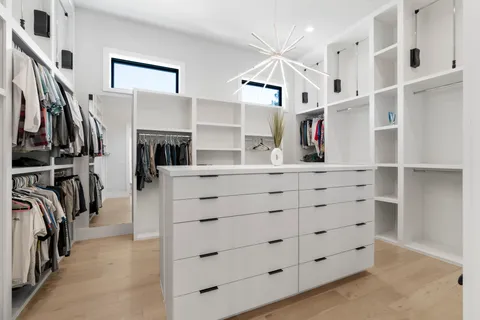 a bed room with a bed and a window