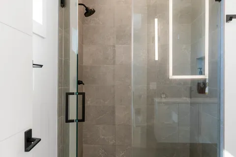 a room with furniture pool table and rug