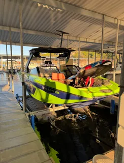 an aerial view of a house with a mountain view