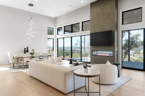 a view of a dining room with furniture window and outside view