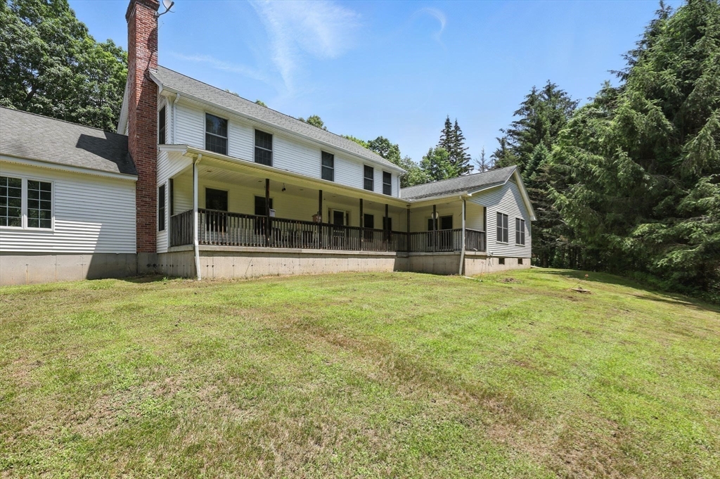 285 Lower Hampden Road Monson, MA 01057 - Photo 28 of 40 a front view of a house with a garden