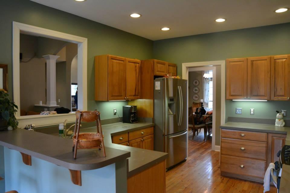 3121 New Ridge Road Elliston, VA 24087 - Photo 11 of 28 a kitchen with kitchen island granite countertop wooden cabinets and refrigerator