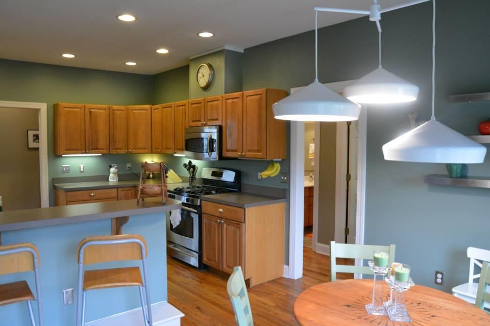 3121 New Ridge Road Elliston, VA 24087 - Photo 12 of 28 a kitchen with a table chairs and flat screen tv