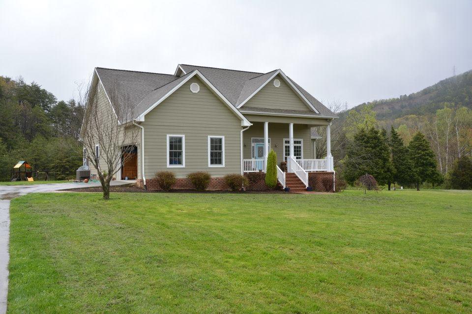 3121 New Ridge Road Elliston, VA 24087 - Photo 25 of 28 a view of a house with a yard