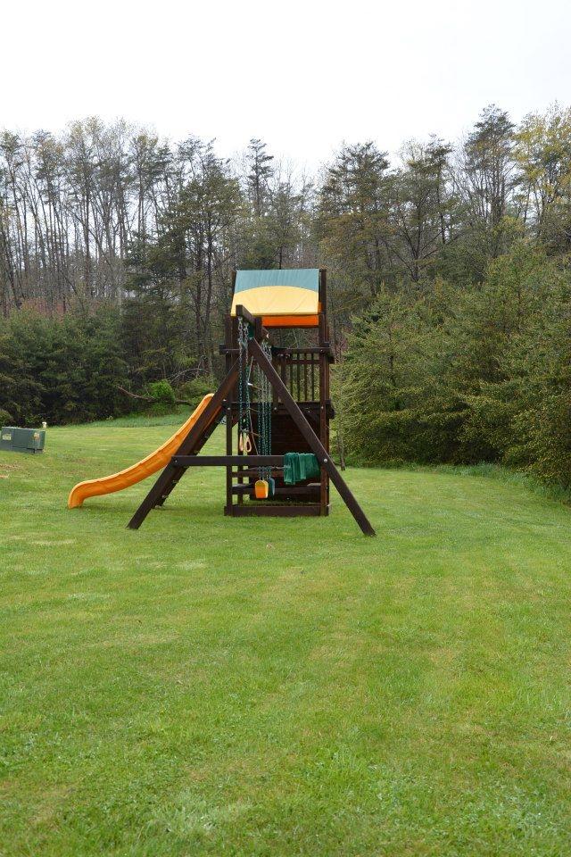 3121 New Ridge Road Elliston, VA 24087 - Photo 26 of 28 a view of a park with a slide