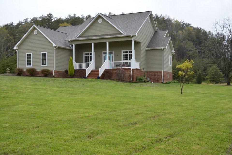 3121 New Ridge Road Elliston, VA 24087 - Photo 27 of 28 a view of a house with a yard
