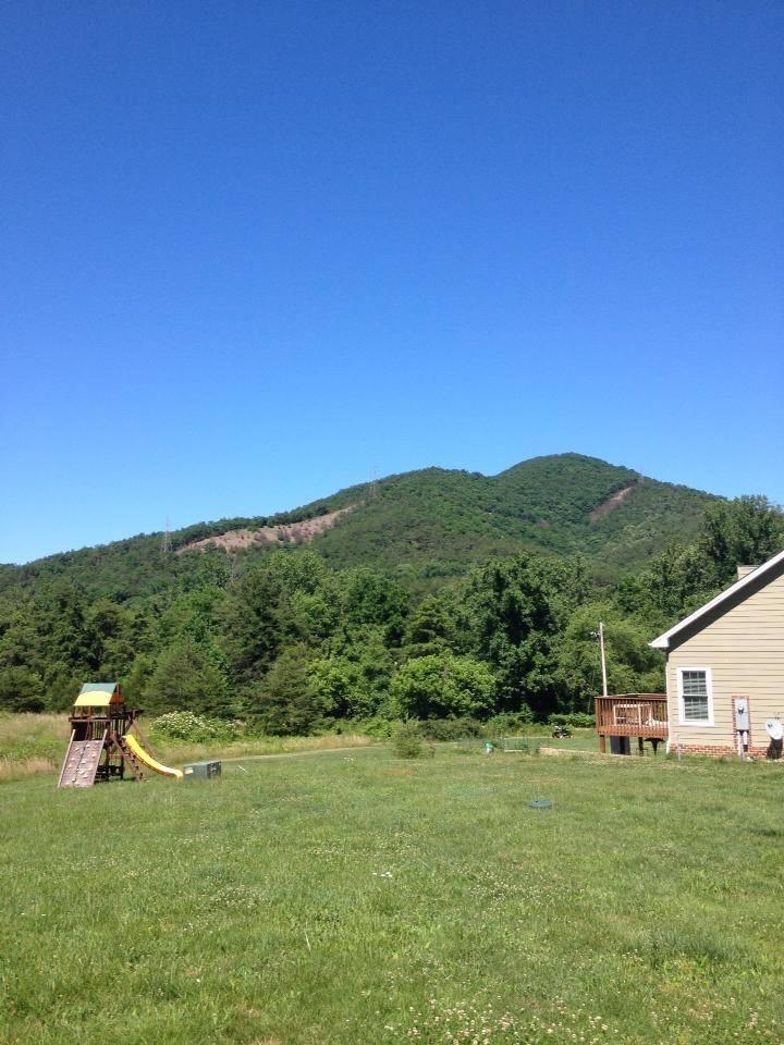3121 New Ridge Road Elliston, VA 24087 - Photo 28 of 28 a view of a house with a outdoor space