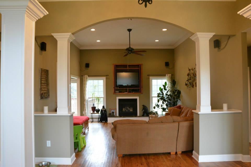 3121 New Ridge Road Elliston, VA 24087 - Photo 5 of 28 a living room with furniture a fireplace and a dining table with a potted plant