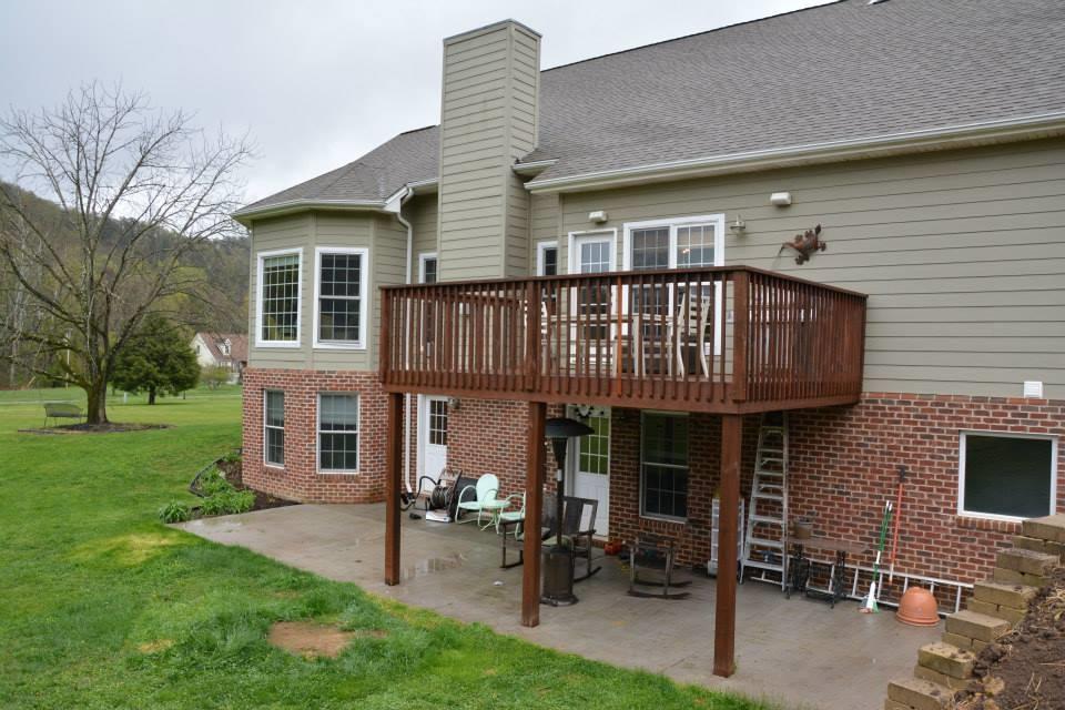 3121 New Ridge Road Elliston, VA 24087 - Photo 9 of 28 a view of a house with a yard and furniture