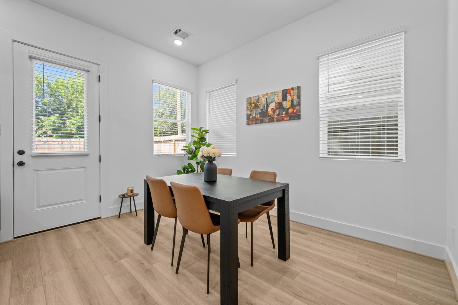 4201 Stassen Street Houston, TX 77051 - Photo 15 of 32 a view of a room with furniture window and wooden floor