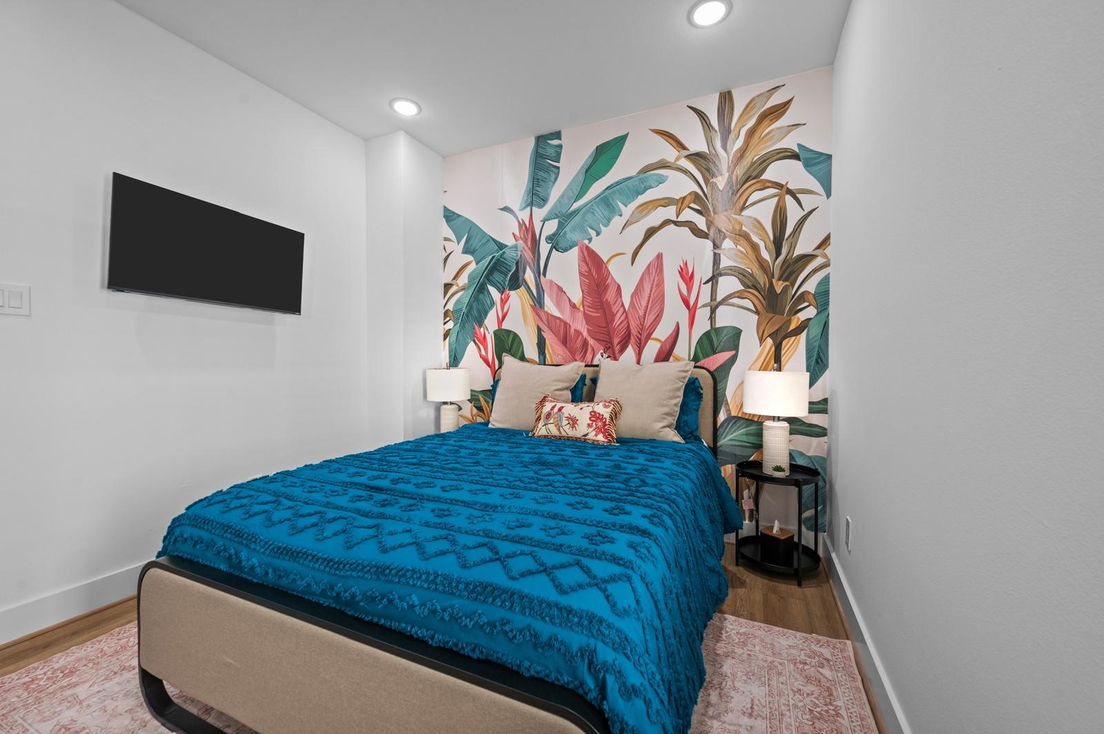 4201 Stassen Street Houston, TX 77051 - Photo 23 of 32 a bedroom with a bed and painting on the wall