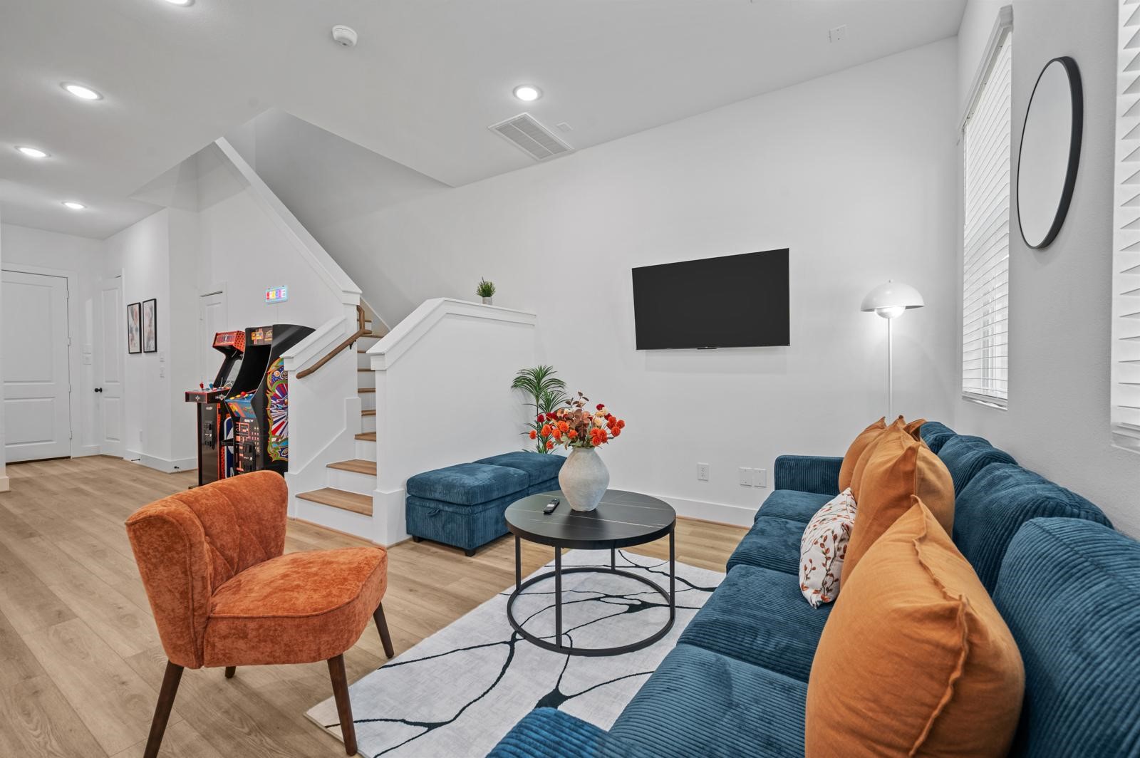 4201 Stassen Street Houston, TX 77051 - Photo 10 of 32 a living room with furniture and a flat screen tv