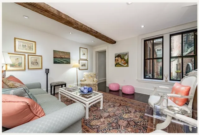 a living room with furniture and window