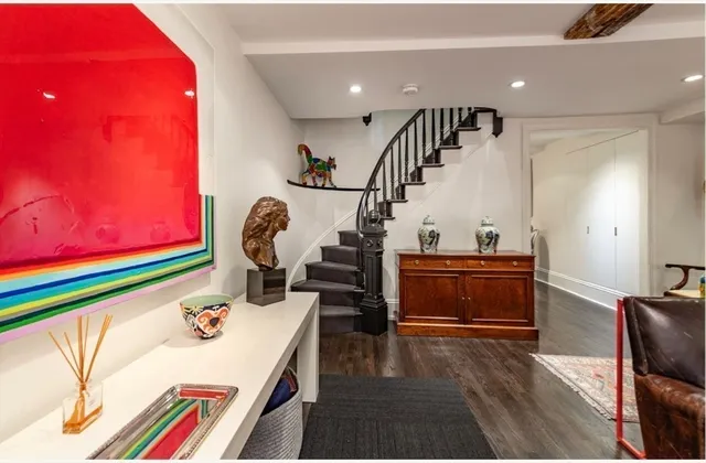 a room with furniture and a wooden floor