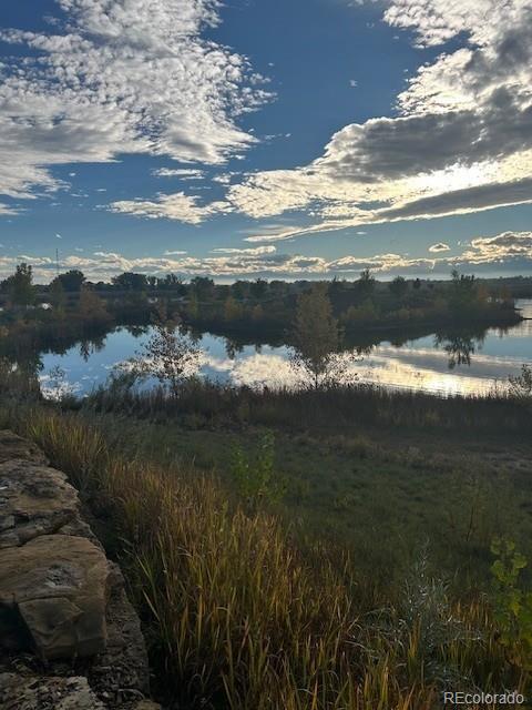 13312 Ladybug Lane Firestone, CO 80504 - Photo 3 of 3 a view of lake with mountain