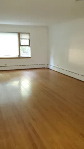 a close view of a utility room with washer and dryer
