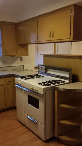 a view of a big room with closet and mirror
