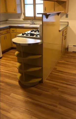 a view of a kitchen with a sink