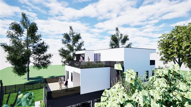 a view of a house with a back yard