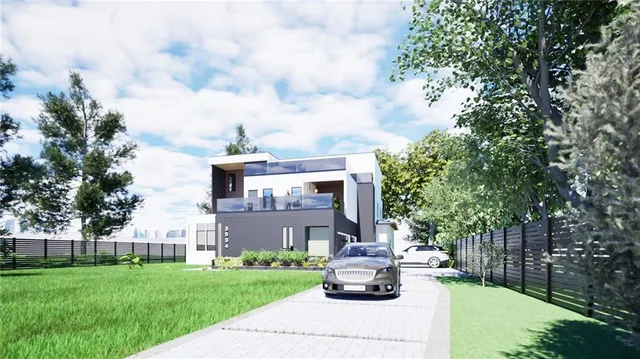 a view of a house with a big yard plants and large trees