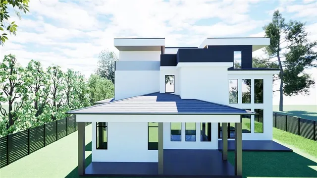 a view of a white house with a big yard and large trees