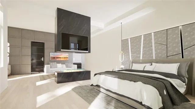 a view of a livingroom with an empty space and a window