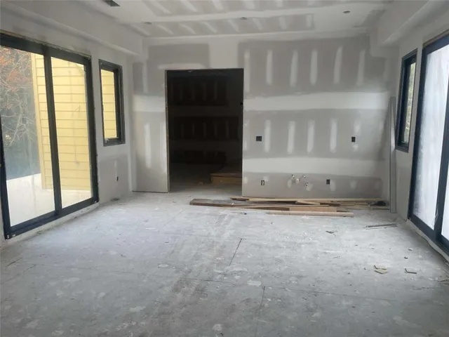 a view of backyard of a house