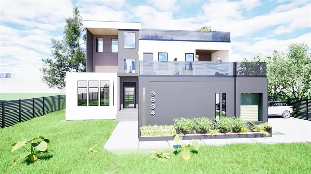 a front view of a house with a yard and potted plants