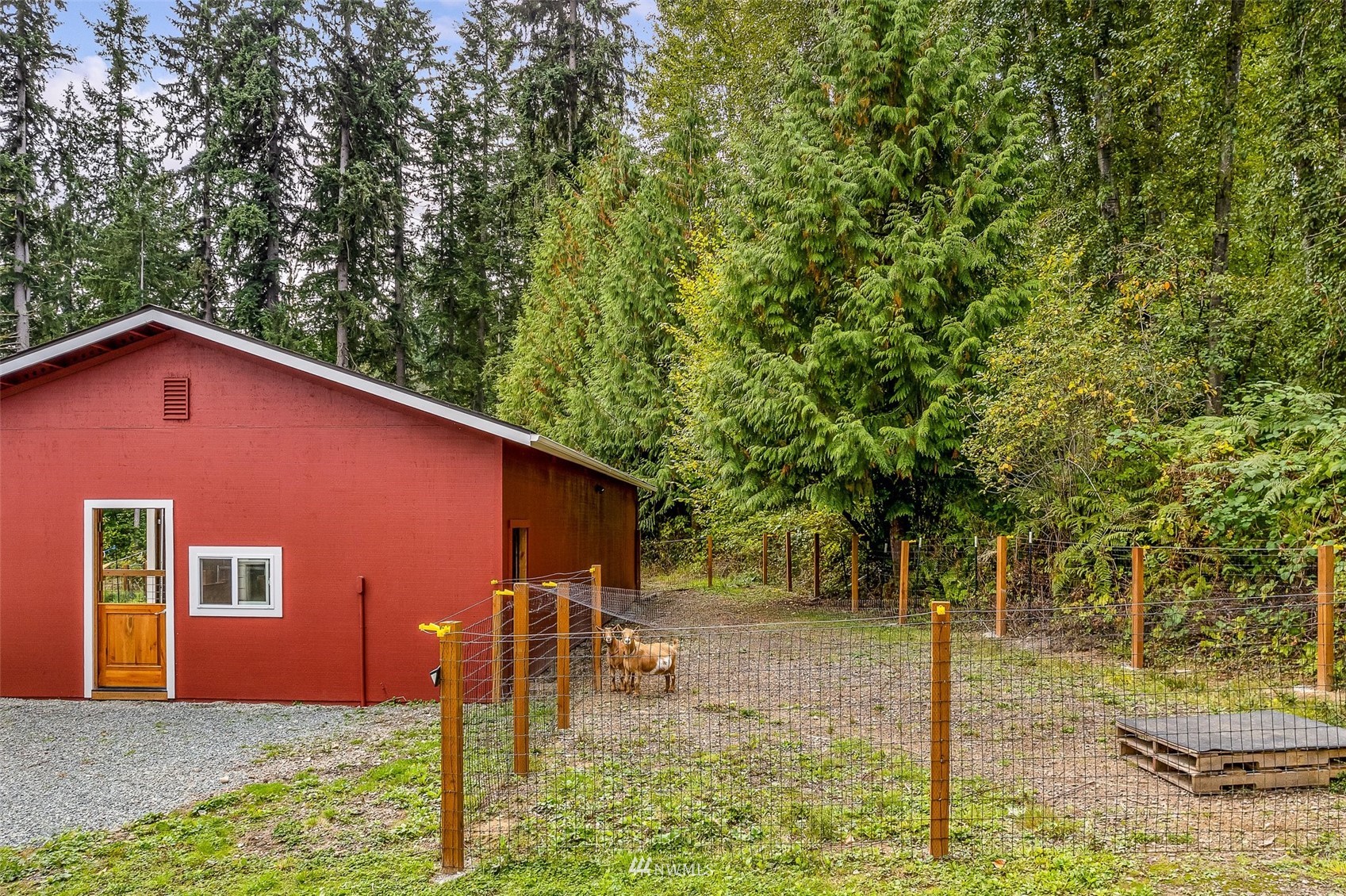 10302 Elliott Road Snohomish, WA 98296 - Photo 17 of 24 a backyard of a house with lots of green space