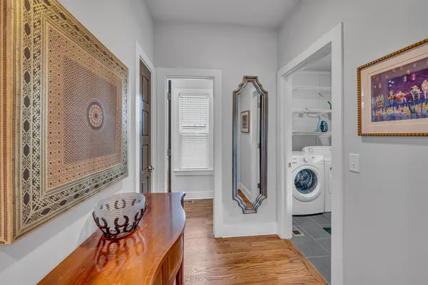 a bathroom with a tub and a shower