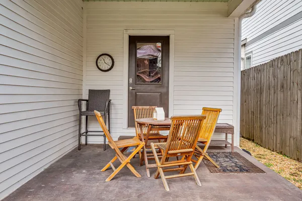 a view of a chairs and table in a house