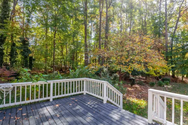 a view of balcony with wooden floor