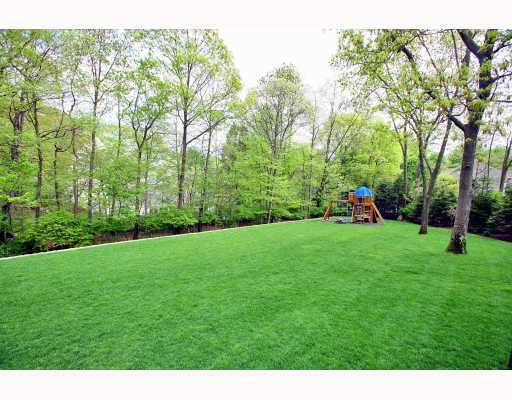 Undisclosed Address Darien, CT 06820 - Photo 13 of 16 a view of yard with green space