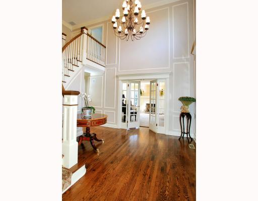Undisclosed Address Darien, CT 06820 - Photo 2 of 16 a living room with furniture and a wooden floor
