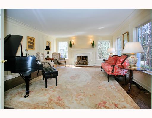 Undisclosed Address Darien, CT 06820 - Photo 3 of 16 a living room with furniture and a fireplace