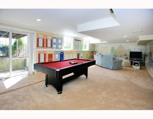 Undisclosed Address Darien, CT 06820 - Photo 9 of 16 a room with furniture and a flat screen tv