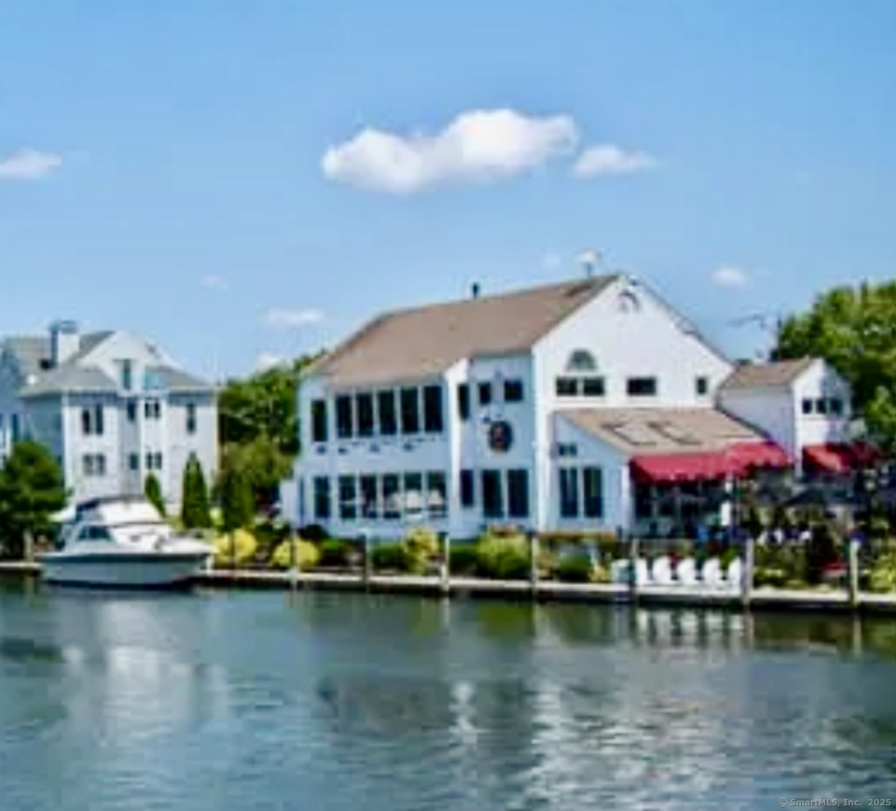 14 Godfrey Street Groton, CT 06355 - Photo 6 of 20 a front view of a building with lake view and boat