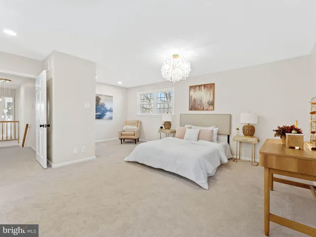 a bathroom with shower and mirror