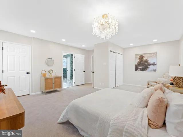 a bathroom with a sink vanity granite and a mirror
