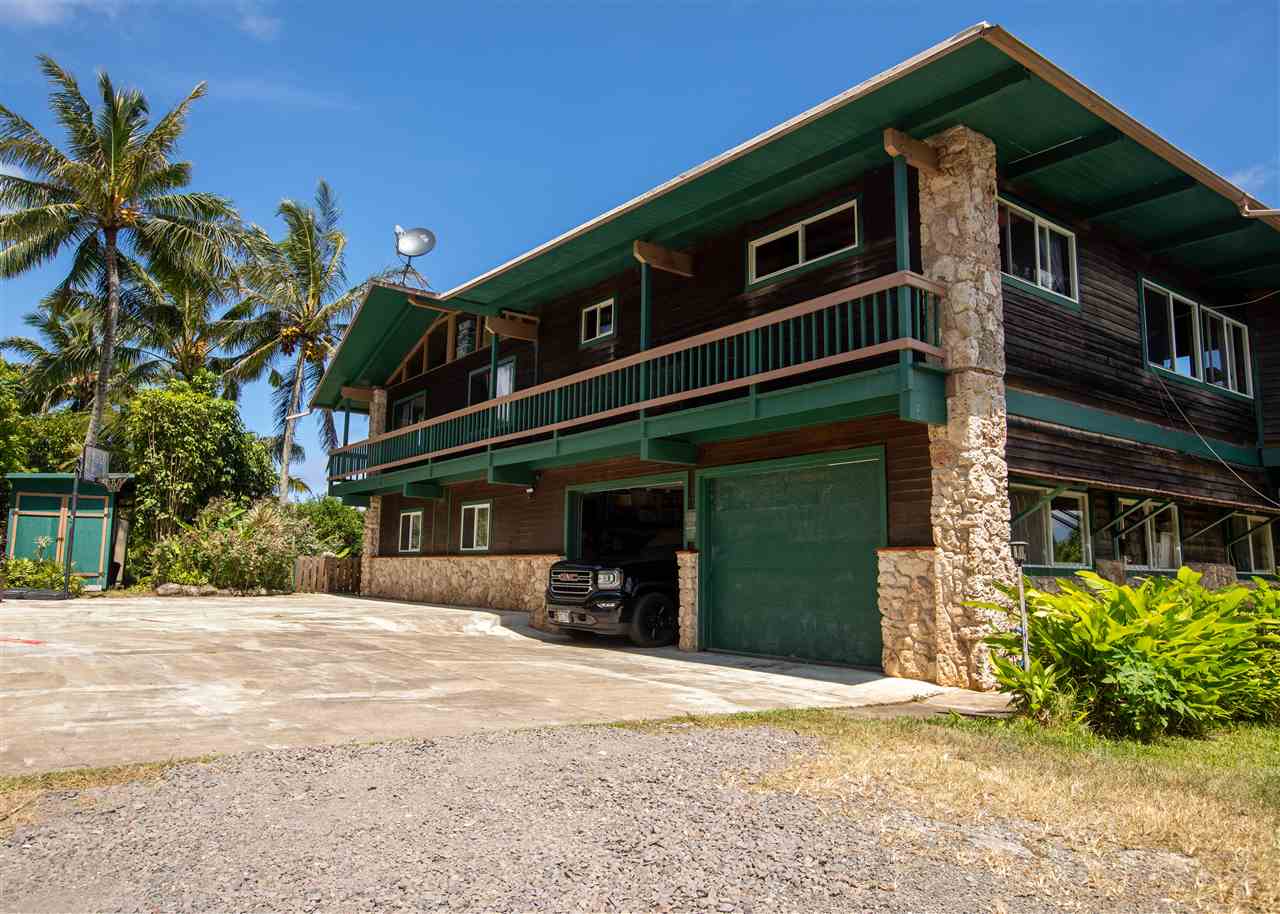 655 Kulike Road, Unit A Haiku, HI 96708 - Photo 2 of 30 a front view of a house with a yard