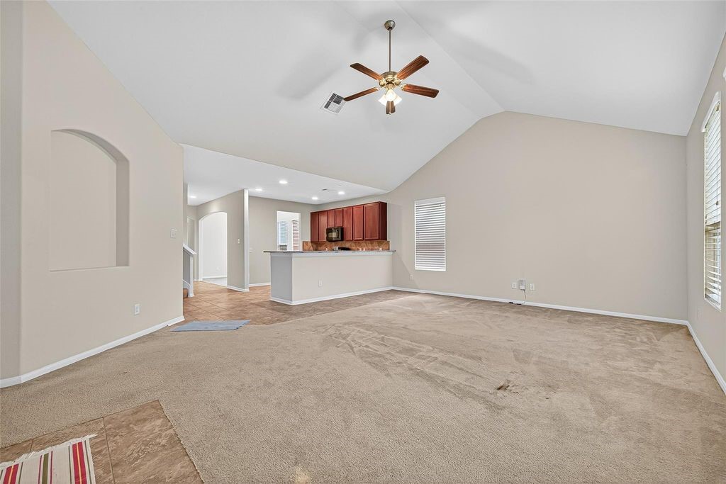 3218 Dappled Vale Trail Spring, TX 77373 - Photo 13 of 47 a view of a livingroom with a ceiling fan