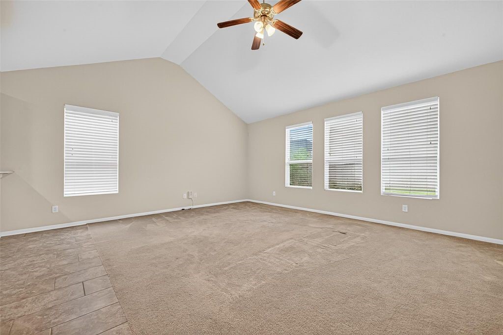 3218 Dappled Vale Trail Spring, TX 77373 - Photo 16 of 47 an empty room with windows and fan