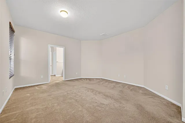 an empty room with an entryway