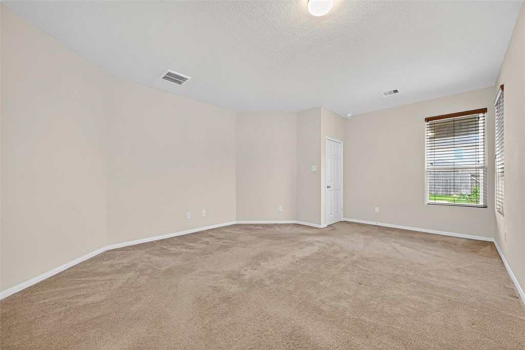 3218 Dappled Vale Trail Spring, TX 77373 - Photo 23 of 47 a view of an empty room with a window